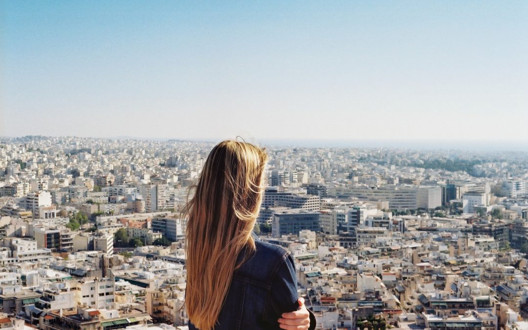 CEO woman overlooking city